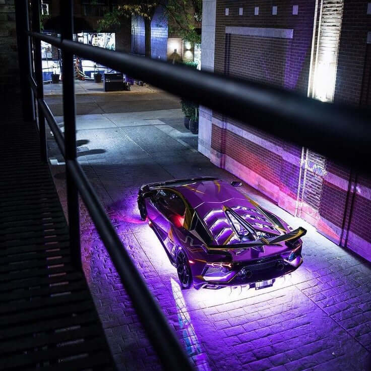 Purple Lamborghini Aventador SVJ super bright Underglow parked in alley toronto canada getunderglow